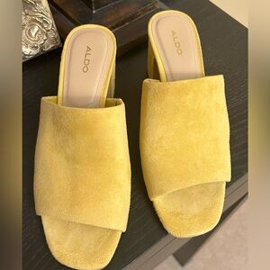 Aldo block heel slipper . 2 inch heel very comfortable .